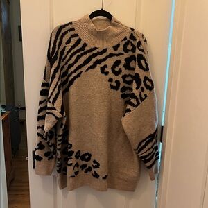 Elegant Animal Print Turtleneck Sweater - Beige and Black